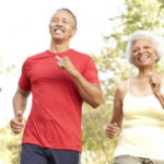 Couple walking after finding effective knee and hip pain relief