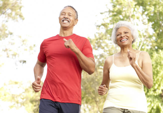 Couple walking after finding effective knee and hip pain relief